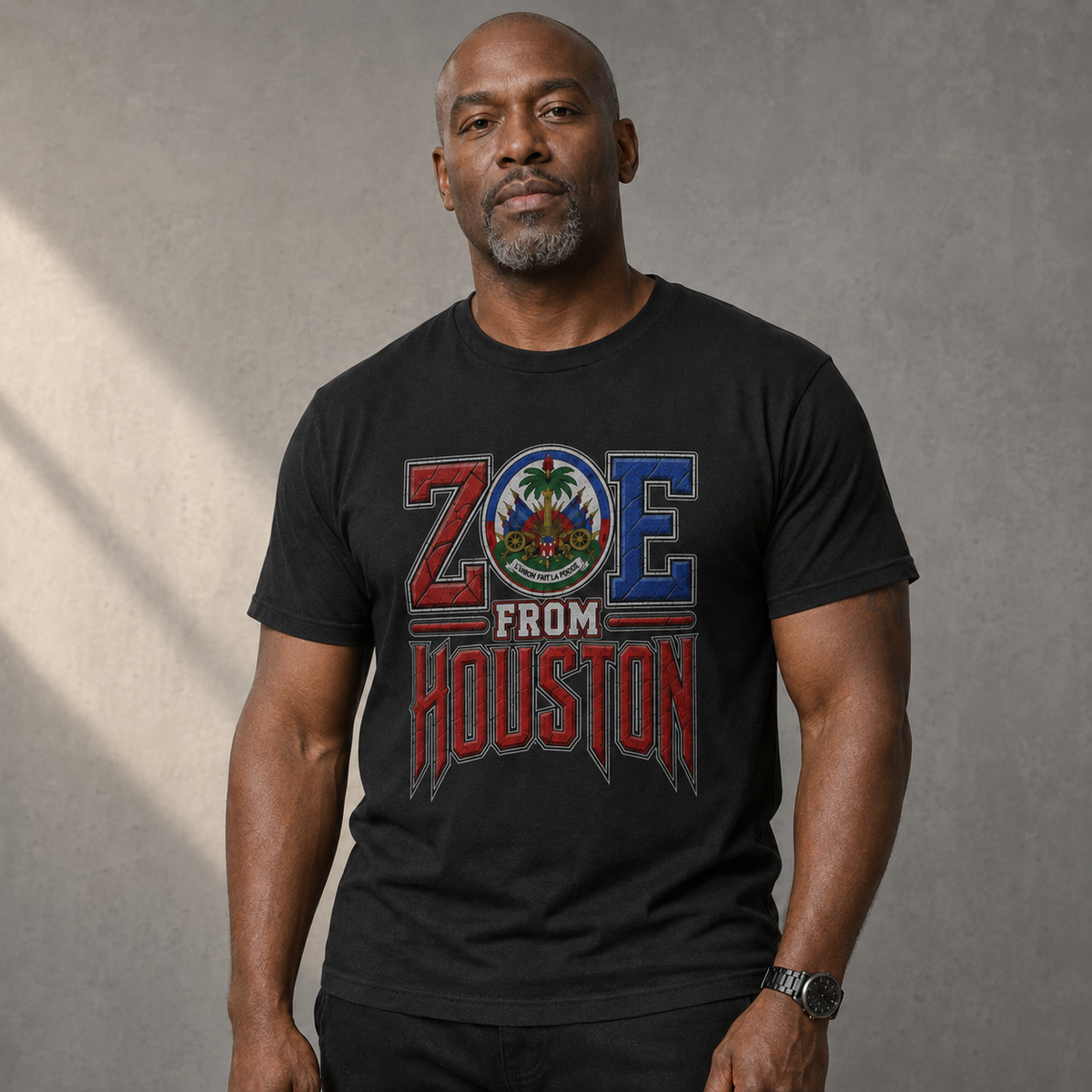 Male model wearing naturally printed black ZOE From Houston T-Shirt